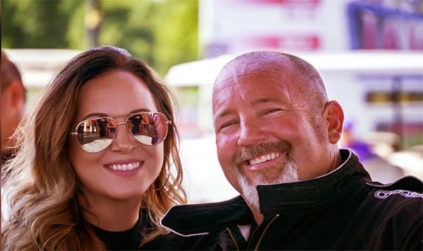 Image of an American drag racer, Chuck Seitsinger and his girlfriend